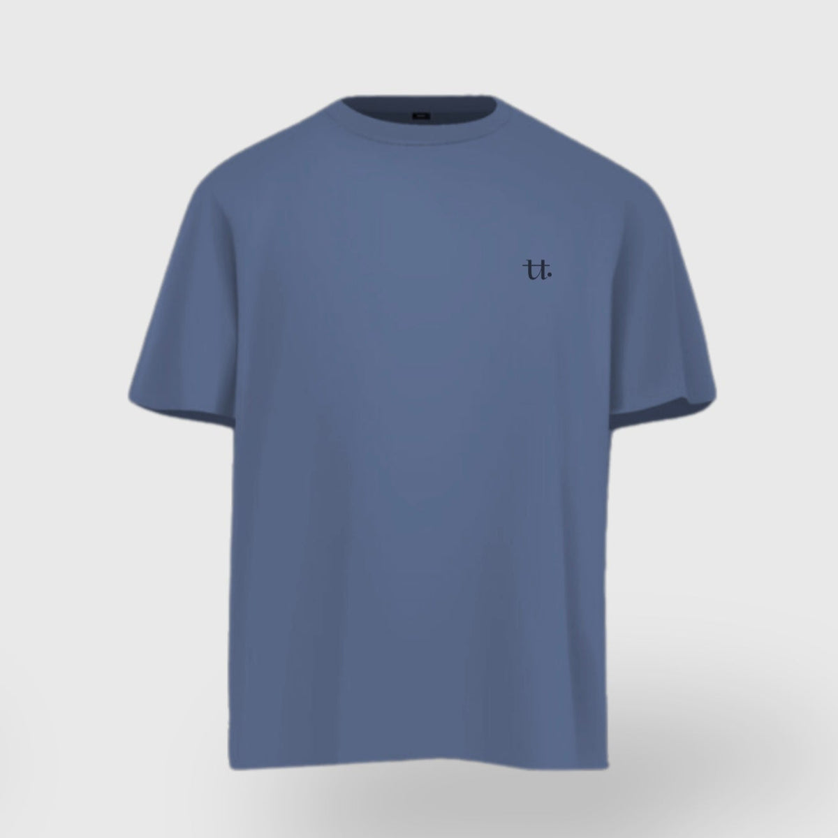 Blue t-shirt with a small logo on a light gray background